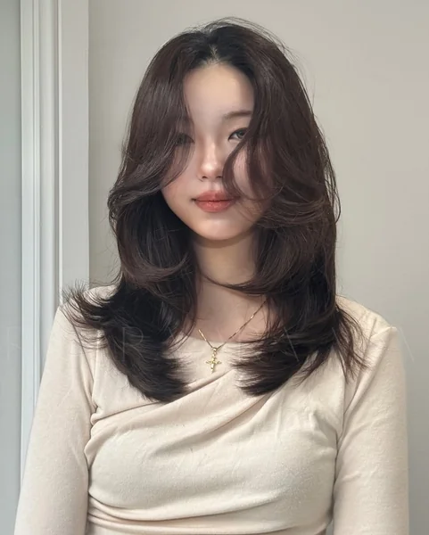 Voluminous Dark Brunette Butterfly Layers for Medium Hair