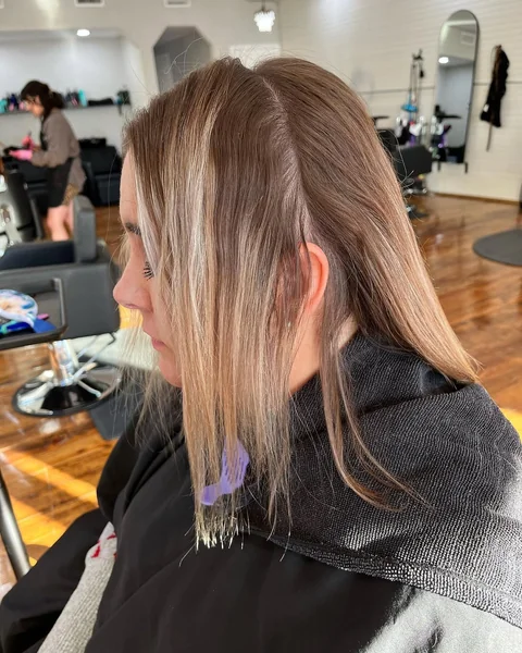 Voluminous Ash Blonde Stacked Bob with Wispy Layers