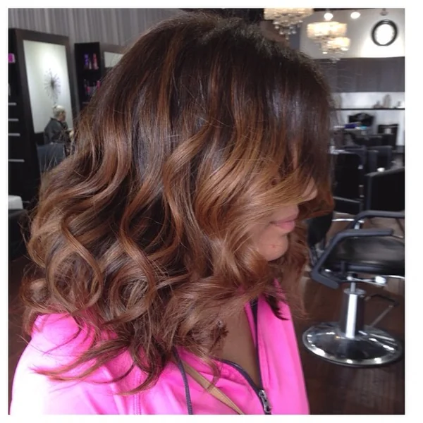 Voluminous Brunette Butterfly Cut with Cascading Layers