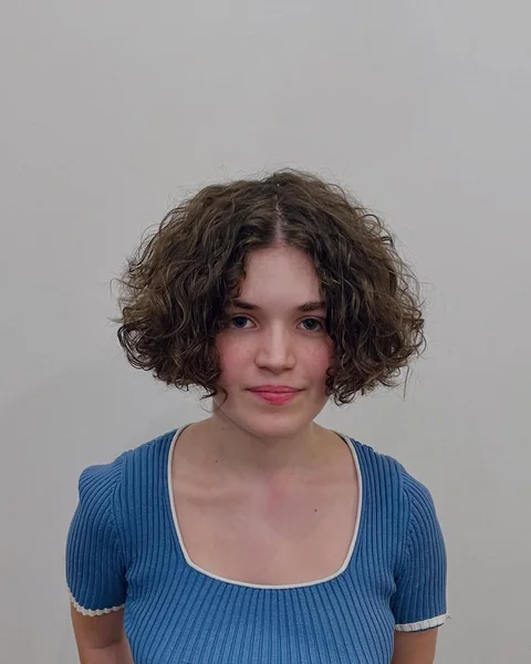 Voluminous Center-Parted Curly Bob with Natural Texture