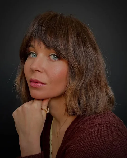 Voluminous Chocolate Bob with Wispy Curtain Bangs