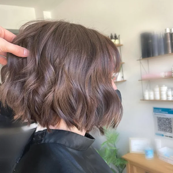 Voluminous Chocolate Brown Bob with Choppy Layers