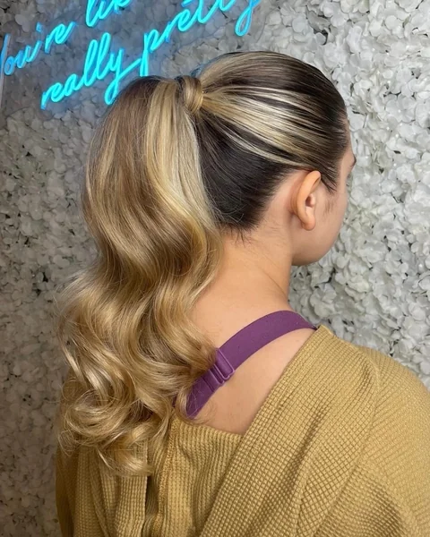 Voluminous Dark Blonde Ponytail with Dark Undercut