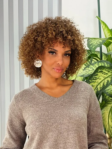 Voluminous Honey Bronze Afro Curls with Defined Ringlets
