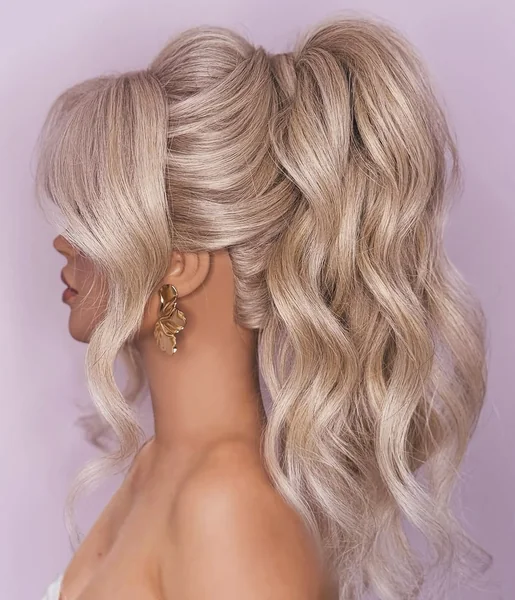 Voluminous Messy Blonde Ponytail with Curtain Bangs