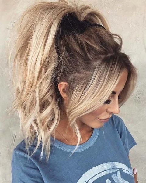 Voluminous Textured Blonde Ponytail for Medium Hair