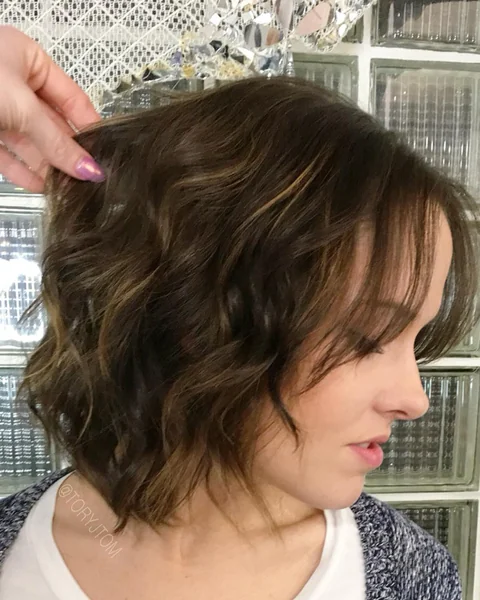 Wavy Brunette Shaggy Bob with Subtle Highlights