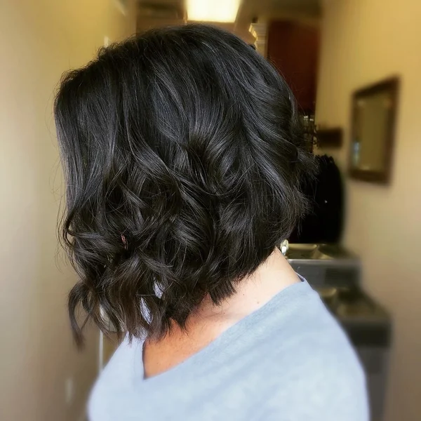 Wavy Midnight Brunette Inverted Bob with High-Shine Finish