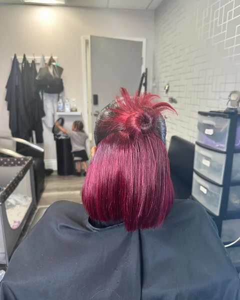 Whimsical Braided Bun with Scattered Rhinestone Accents
